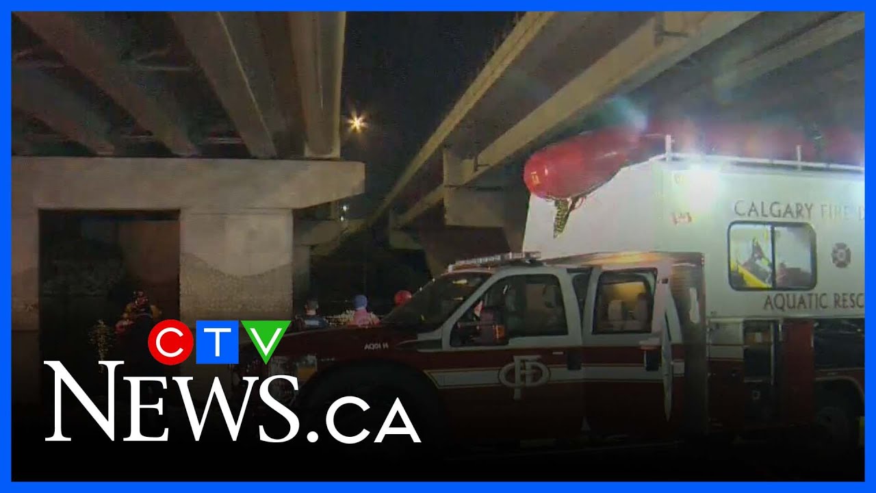 Crews pulling stolen Tesla out of the Bow River