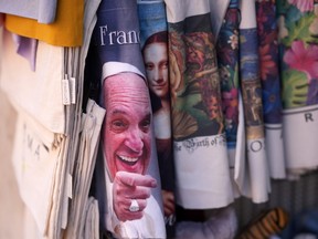 Pope improves slightly as Vatican explains hospital photo