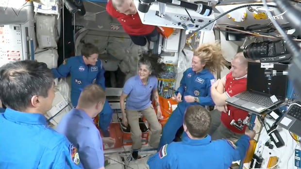 Space crew docks at ISS to replace 2 astronauts stranded for 9 months